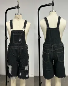 Front and back view of men's black distressed denim overalls shorts with ripped details