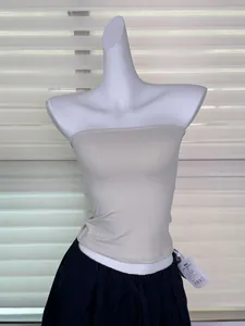 Skin-friendly elastic beige tube top shown on a white mannequin torso for a detailed fit view