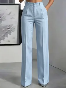 Close-up of light blue high-waisted pinstripe wide-leg trousers for women