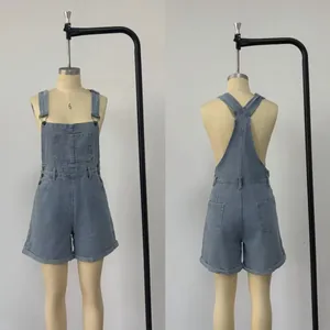 Front and back view of loose denim overall shorts with multiple pockets for women.
