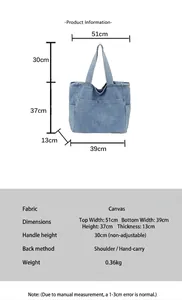 Detail view of denim tote bag specifications including handle height and bottom width measurements