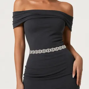 Elegant floral rhinestone waist belt for weddings and banquets on a black dress