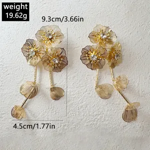 Bijoux vintage en feuilles de ginkgo dorées dimensions 9,3cm longueur poids 19,62g