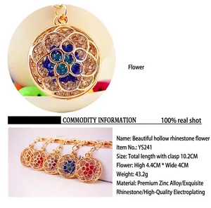 Detailed view of hollow flower keychain with sparkling rhinestones and dimension specs