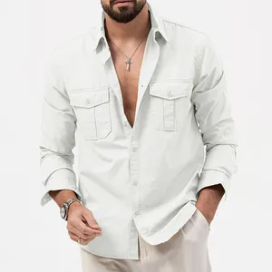 Detailed view of white men's utility shirt with double chest pockets and buttons