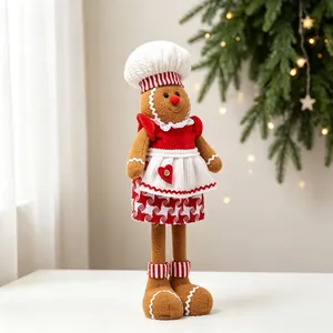 Cute plush gingerbread man chef doll Christmas decoration with red heart apron and hat