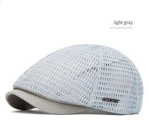 Detailed view of a light gray summer mesh beret featuring a breathable hollow design