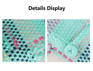 Macro view showing the intricate hand-woven texture of the colorful plastic basket bag