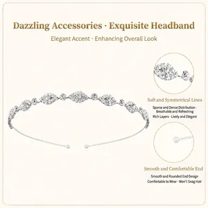 Detail view of a minimalist silver headband with sparkling rhinestones and rounded comfort ends.
