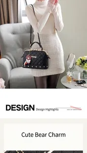 Black quilted top handle bag featuring luxury rhinestone details and a cute bear charm