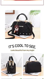 Detail views of black quilted handbag with diamond studs and cute brown bear charm