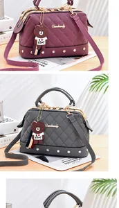 Elegant quilted doctor handbag featuring a cute bear charm and metallic hardware detailing