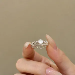 Elegant silver finish double-layer open ring featuring heart patterns and zircon accents