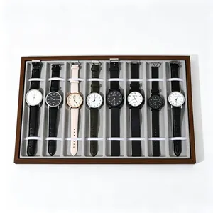 Premium 8-slot walnut wood grain watch display tray with soft grey velvet lining and elastic straps