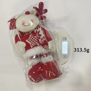 Weight measurement showing a 313.5g plush Christmas reindeer doll in plastic wrap