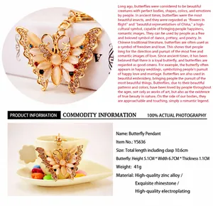 Detailed view and specifications of a rhinestone butterfly keychain with cat-eye stones