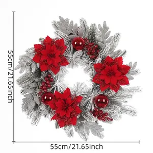Gedetailleerd overzicht van 55cm gevlokte kerstkrans met rode kerststerren en ballen