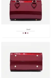 Detailed back and bottom views of a red patent leather handbag showing metal feet