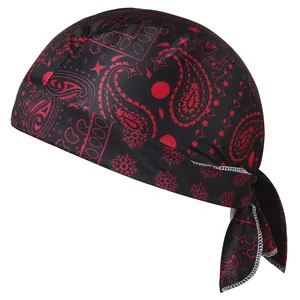 Detailed close-up view of red paisley pattern on black elastic bandana pirate hat.