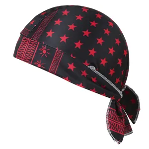 Close-up of elastic pirate hat with red star patterns and intricate sun-motif borders