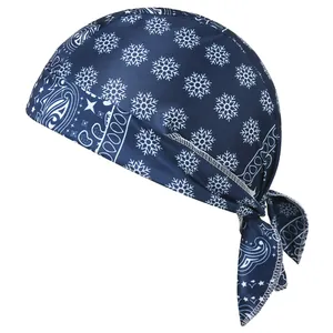 Macro detail of elastic navy blue bandana cap with snowflake and paisley pattern stitching