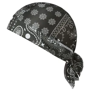 Close-up detail of black elastic pirate hat with white paisley and snowflake patterns