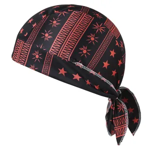 Detail view of black cycling bandana cap with red star and sun patterns