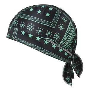 Detailed macro view of black elastic fabric cycling bandana with mint star patterns