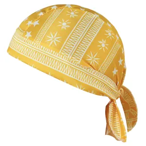Detailed macro view of yellow cycling pirate hat with white star and sun patterns