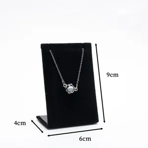 Black velvet jewelry display stand with dimensions 6x4x9cm for necklace and earrings storage
