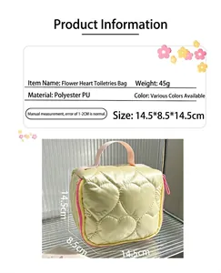 Cute yellow heart quilted travel toiletry bag with pink handle and zipper details