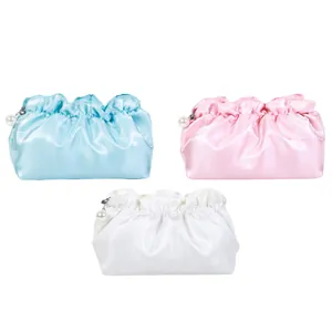 Set of three elegant satin ruffled cosmetic bags with pearl zipper pull in pastel colors
