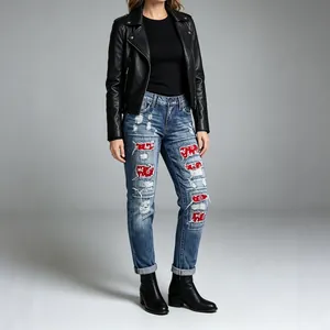 Women's distressed straight-leg denim jeans with Christmas HO HO HO print patches