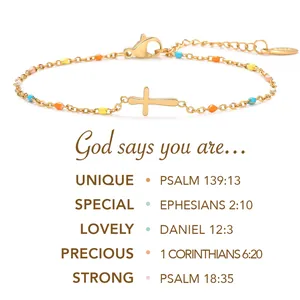Bracciale croce in acciaio inox dorato con perline colorate e ispirazione religiosa