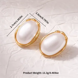 Vintage French style large oval faux pearl earrings with gold-toned metal frame