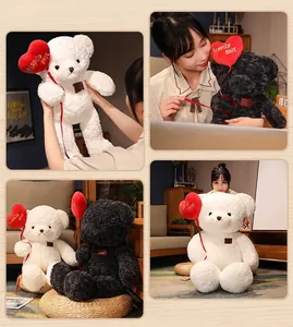 Plush teddy bear holding a red heart balloon perfect for Valentine's Day or romantic gift