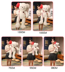 White plush teddy bear with heart balloon shown in five different sizes for comparison