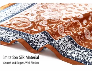 Macro shot of a brown and white paisley pattern on silky imitation silk fabric