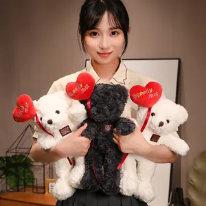 Valentine's Day plush teddy bears with red heart balloons and happily met embroidery