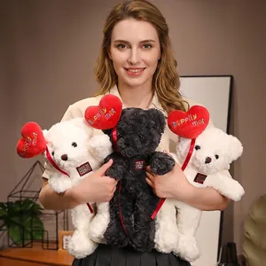 Valentine's Day plush teddy bears with red heart balloons and happily met embroidery