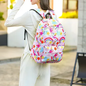 Detail view of girls waterproof school backpack with colorful starry rainbow print