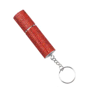 Detailed view of a sparkling red rhinestone refillable perfume atomizer keychain
