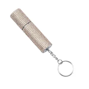 Detail view of pink rhinestone-encrusted portable perfume atomizer with keychain