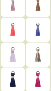 A collection of colorful 2cm mini silk tassels with gold thread for DIY jewelry making