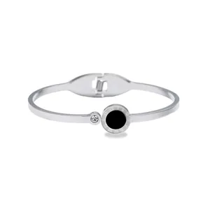 Elegant silver-toned titanium steel bracelet featuring Roman numerals and a black circular inlay
