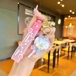 Simpatico portachiavi a lecca-lecca rosa con sabbie mobili e cinturino Happy Moments