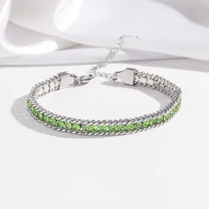 Silver-tone titanium steel bracelet featuring vibrant green circular zircon stones