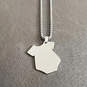 Close-up of a polished stainless steel necklace with a unique onesie-shaped pendant