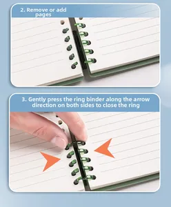 Close-up detail view showing how to add paper pages and close the loose-leaf binder rings