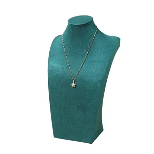 Teal velvet bust mannequin for necklace and jewelry pendant display on white background